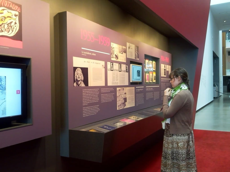 Surrealism interactive area with section discussing various surrealist publications