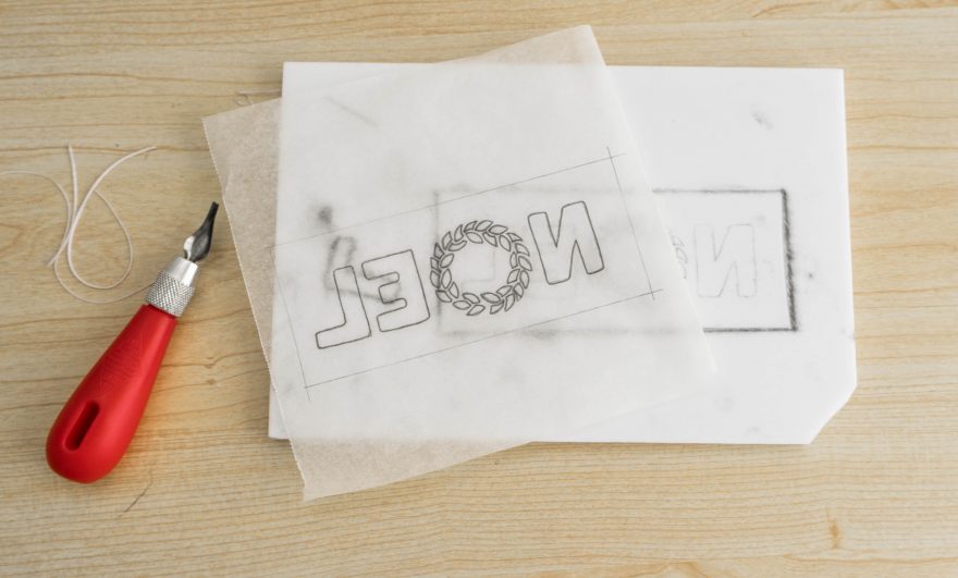 Tracing the design onto the lino