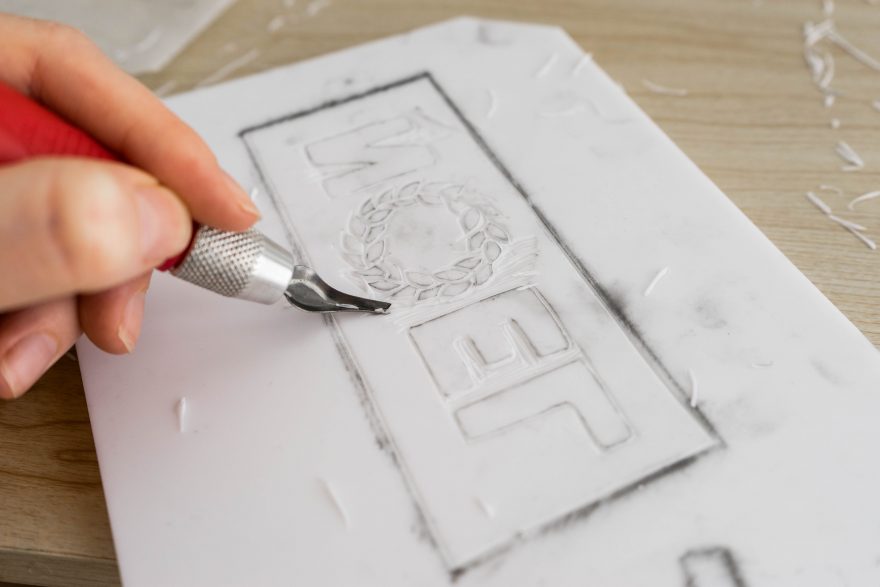 Cutting out the Noel card in the easy cut lino block